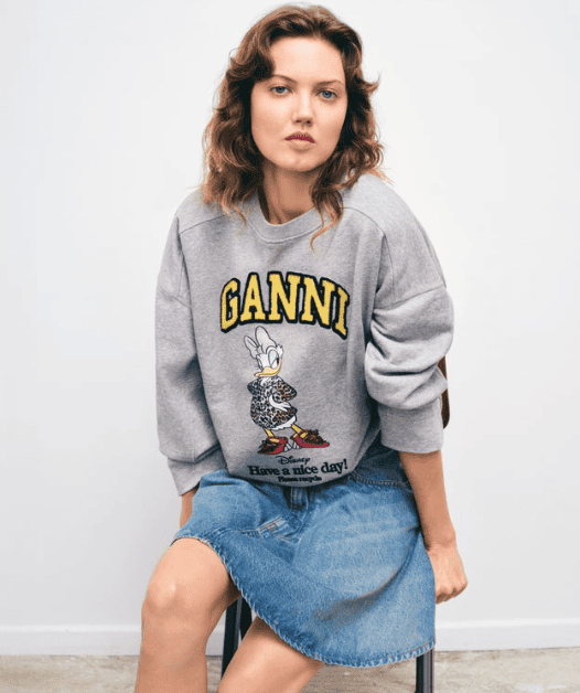 Ganni Disney sweatshirt with Daisy Duck graphic, casual chic Disney-inspired fashion.