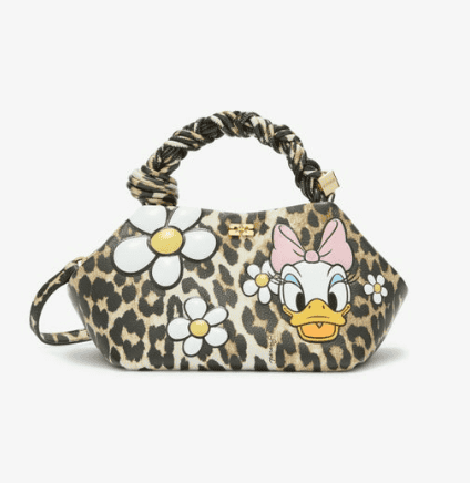 Leopard print handbag featuring Daisy Duck and floral accents for Disney fashion lovers.