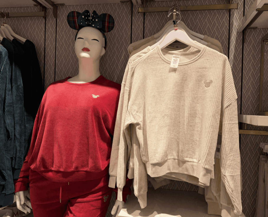 Soft Disney-themed sweatshirt and joggers for Disney fans. Perfect for casual, stylish comfort.