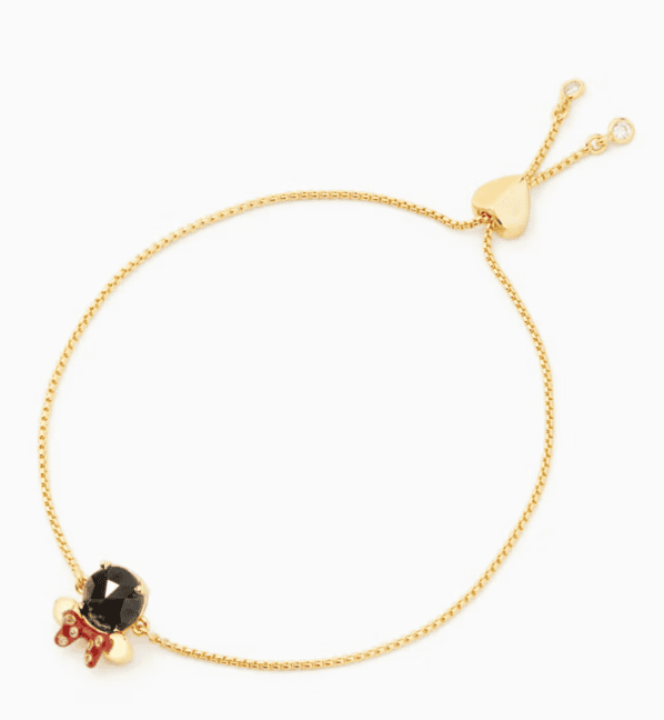 Gold Disney charm bracelet with black gemstone and heart-shaped clasp.