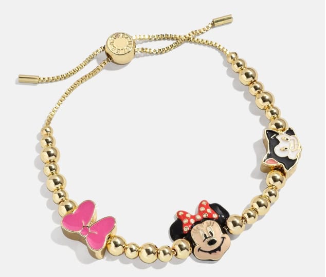 Gold Minnie Mouse bracelet with Disney character charms.
