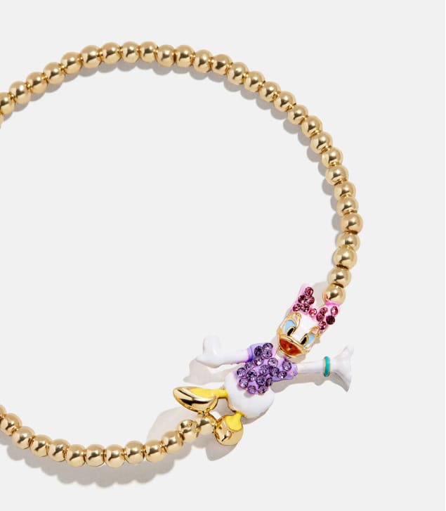 Dainty gold beaded necklace with Minnie Mouse charm and colorful crystals, perfect for Disney fashion lovers.