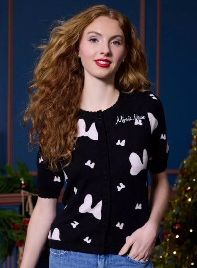 Cute Disney-inspired sweater with butterfly patterns and "Minnie Mouse" embroidery, perfect for Disney fashion fans.