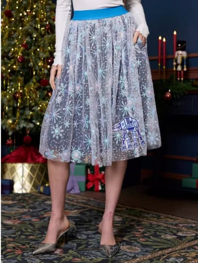 Deluxe Frozen-inspired tulle skirt with snowflake and Olaf embroidery, perfect for Disney fans.