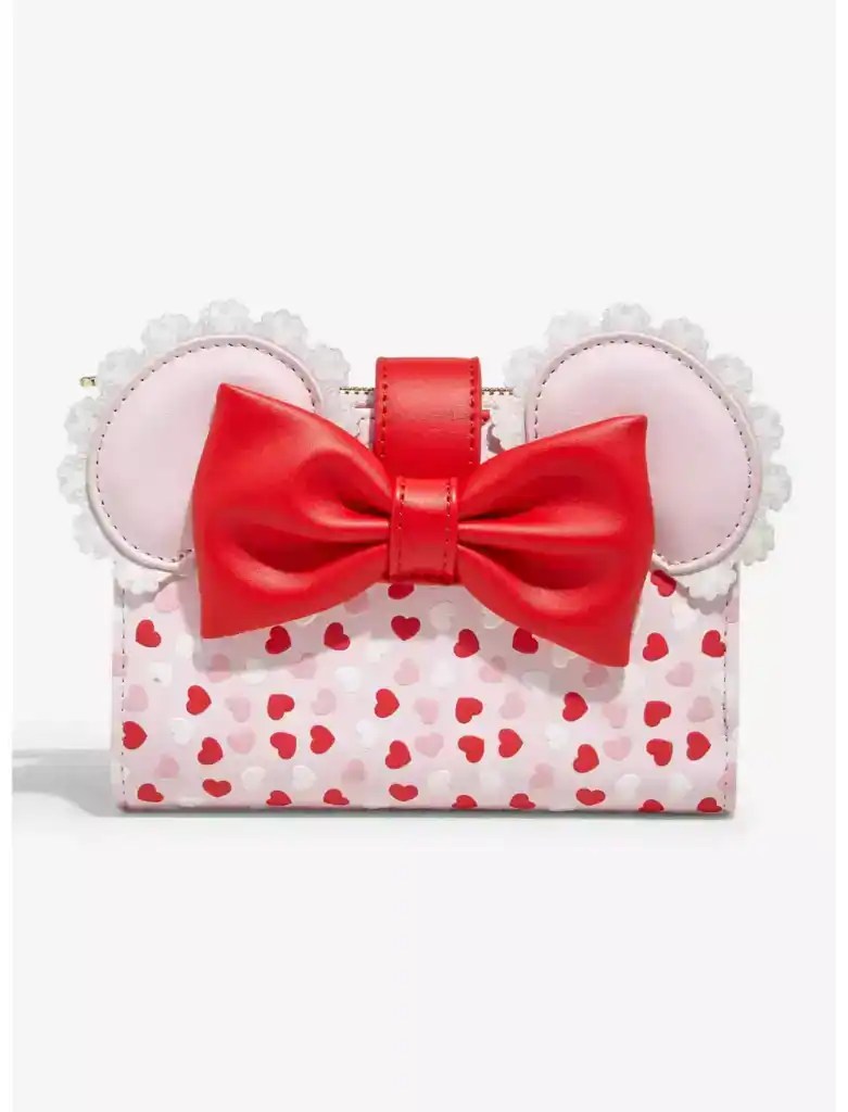 Minnie Mouse-inspired designer handbag featuring pink hearts, red bow, and signature mouse ears. Perfect for Disney fashion fans.