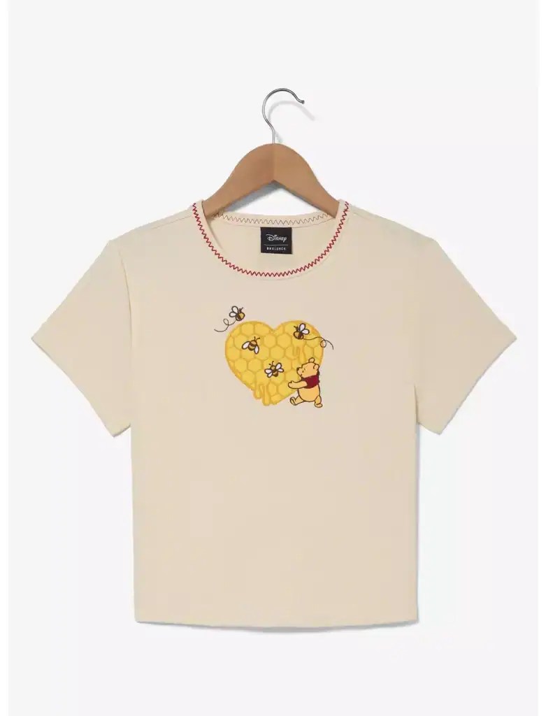 Cute Winnie the Pooh honey heart graphic T-shirt for Disney fans. Perfect for kids' casual wear and Disney-themed outfits.