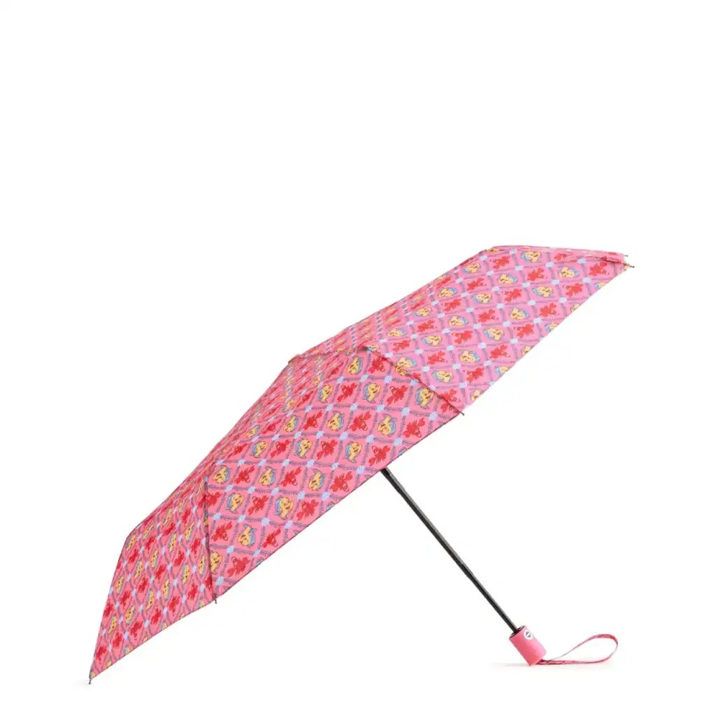 Colorful Disney-themed children's umbrella with pink background and character prints.