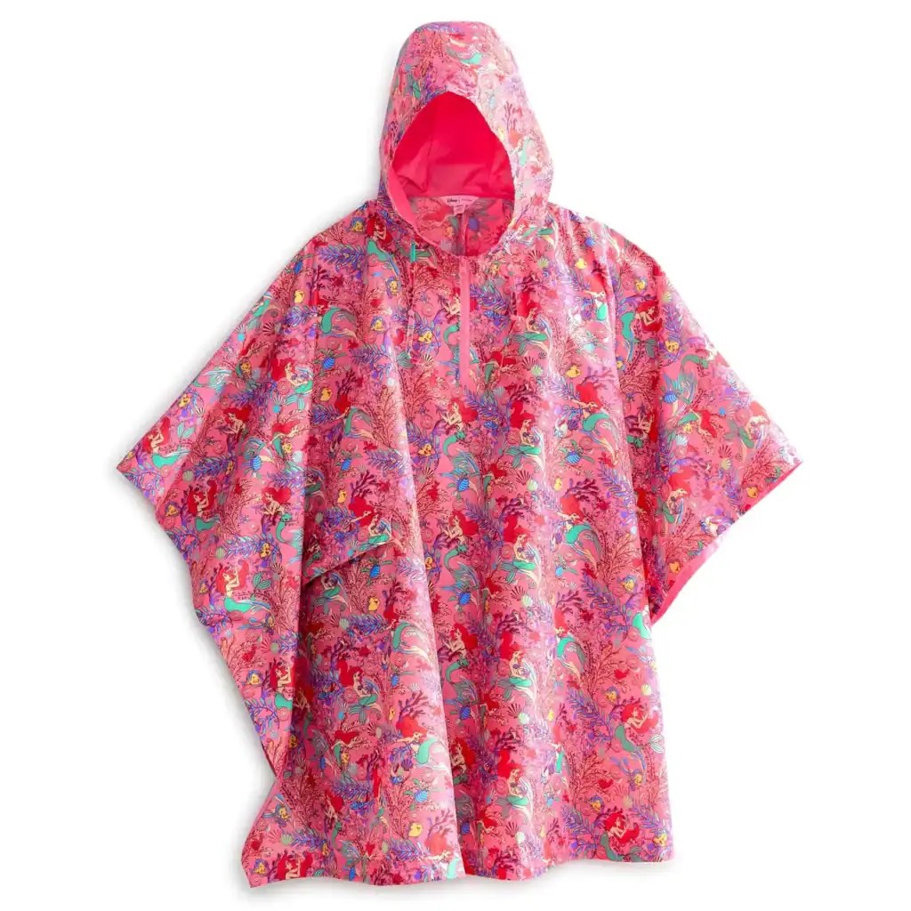 Pink Disney princess poncho featuring colorful mermaids, fairies, and enchanted motifs, perfect for fans.