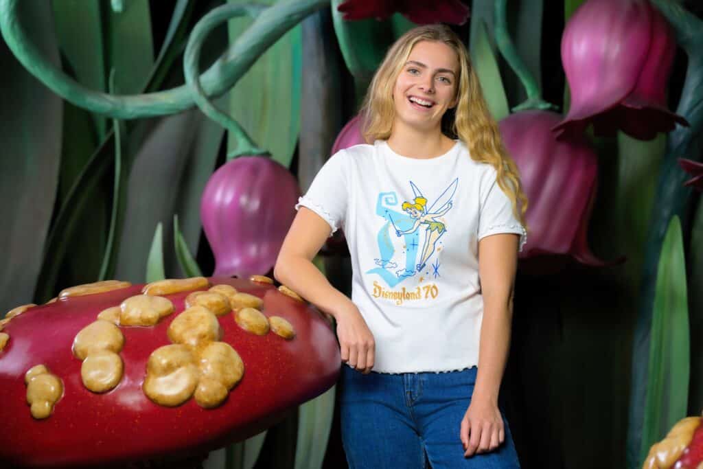 Disneyland 70th anniversary t-shirt with Tinker Bell graphic. Perfect Disney themed fashion for fans.