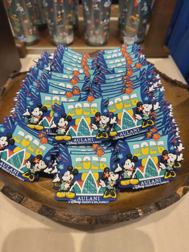 Bright Disney 2026 Mickey Mouse island resort souvenir badge.
