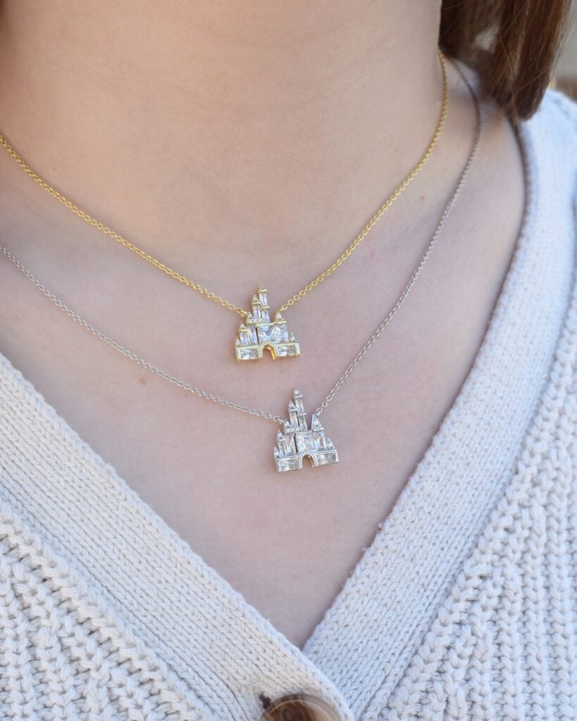Delicate layered necklaces featuring a sparkling castle pendant, perfect for Disney fans and jewelry lovers.