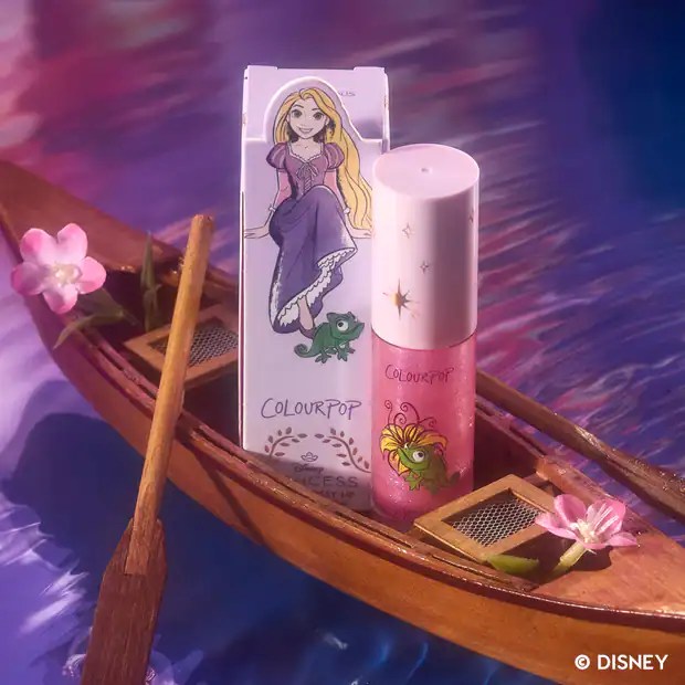 Vibrant Colorpop Disney lip gloss with fairy characters.