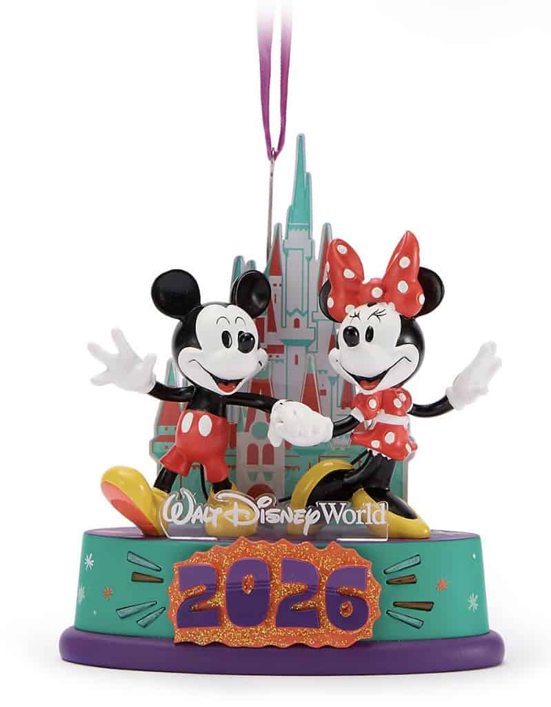 Colorful Disney Mickey and Minnie figurine for Disney fans, with a Disneyland castle backdrop.