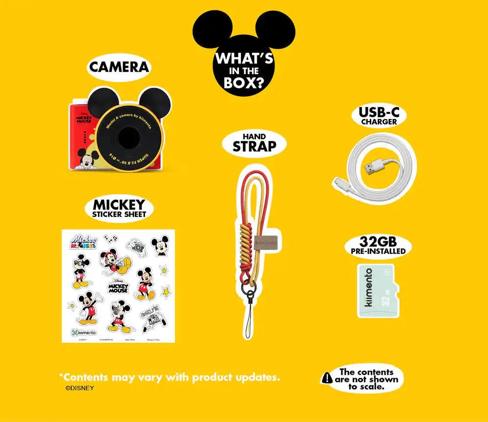 Mickey Mouse themed digital accessories including camera, sticker sheet, USB-C charger, and hand strap.
