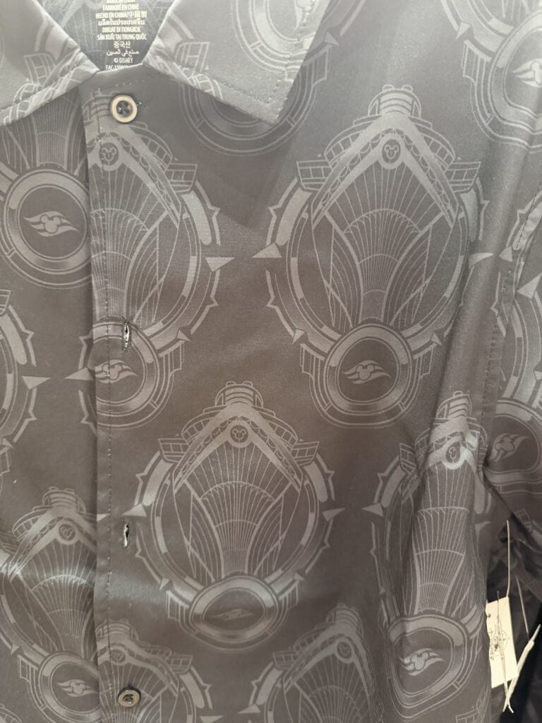 Stylish grey shirt with intricate Disney-inspired pattern, perfect for Disney fashion lovers.