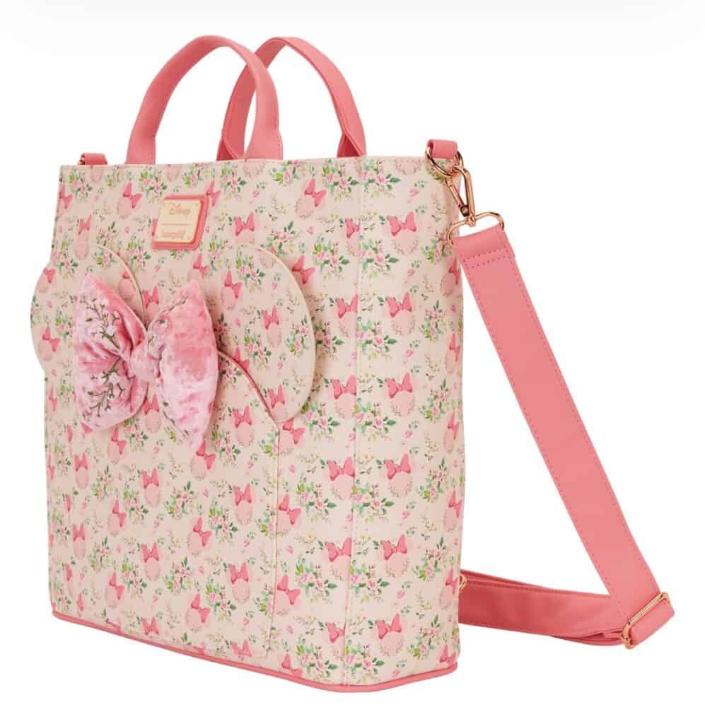 Disney Minnie Mouse tote bag with plush bow, pink floral pattern, ideal for Disney fashion lovers.