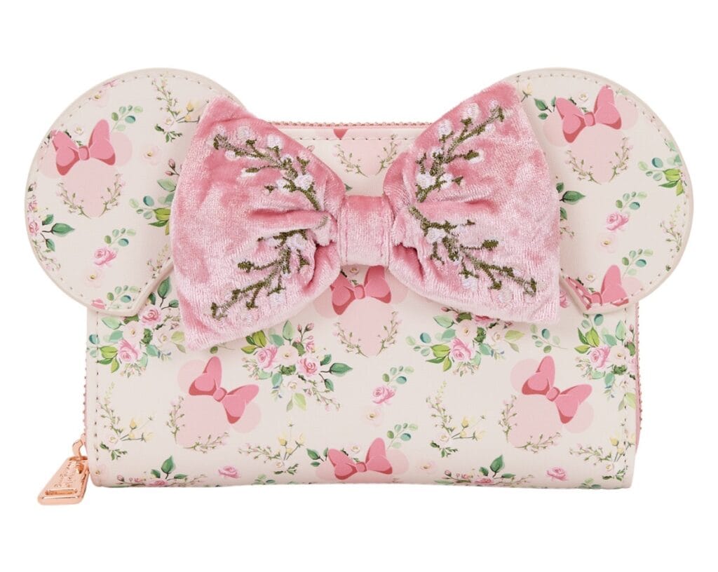 Playful Minnie Mouse themed floral clutch with pink velvet bow, perfect for Disney fashion lovers.