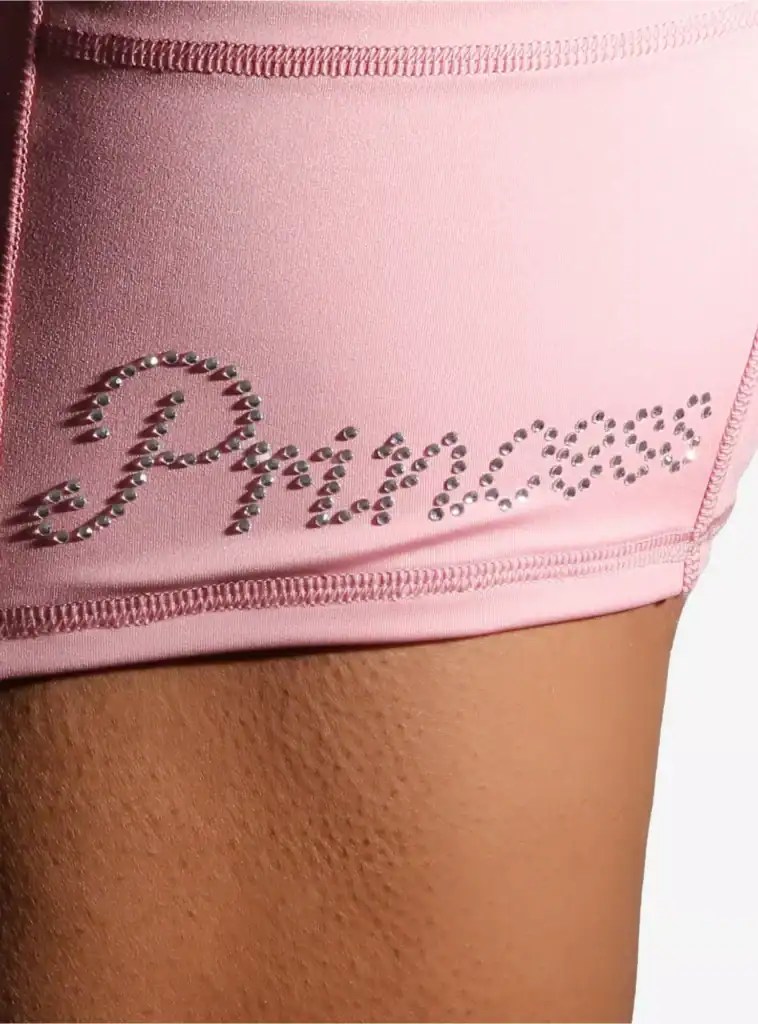 Pink Rihanna baseball cap with rhinestone "Rihanna" logo, stylish accessory for fans of Rihanna.