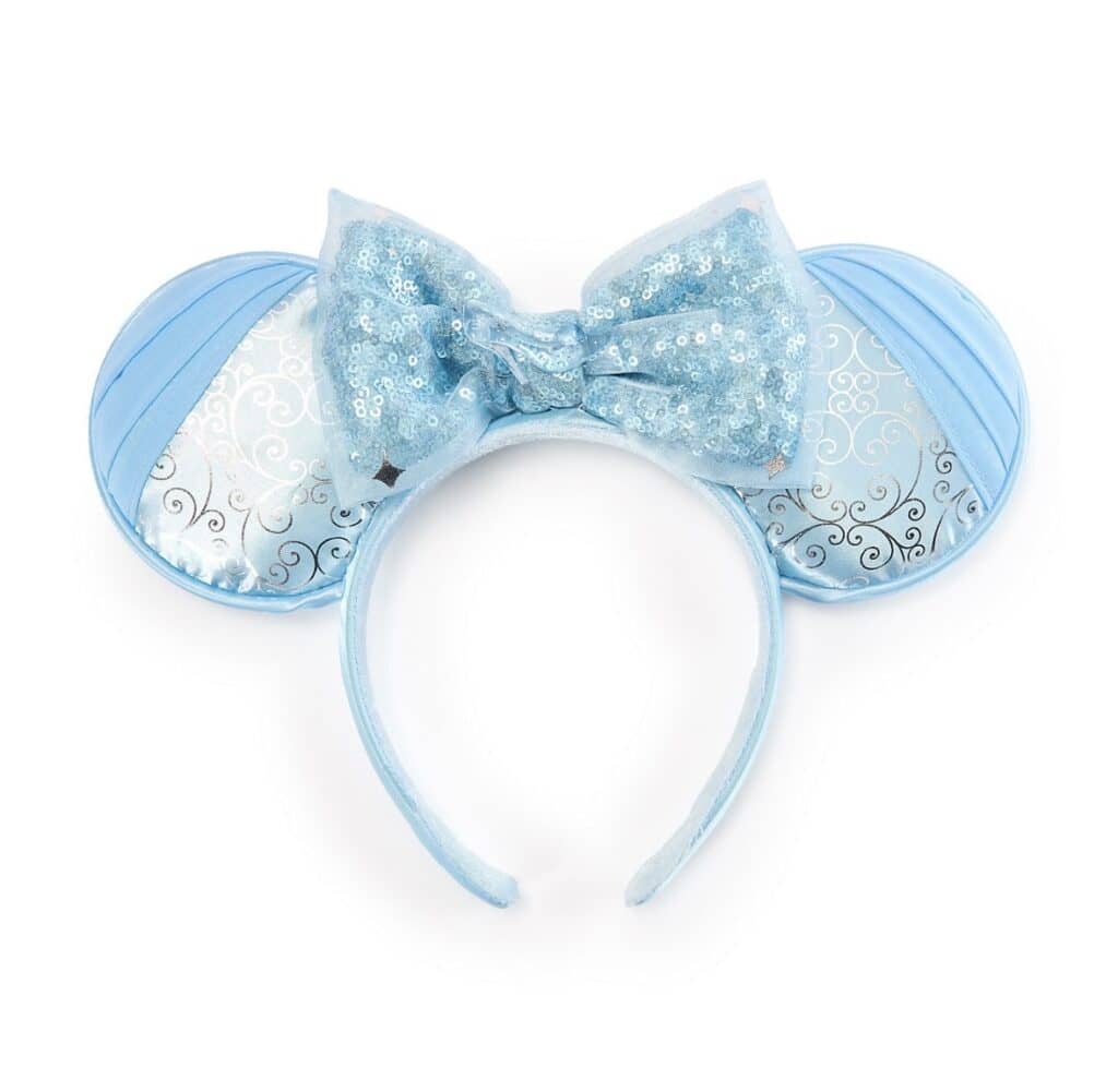 Blue Disney Mickey Mouse ears with sparkly bow for perfect Disney costume accessory.