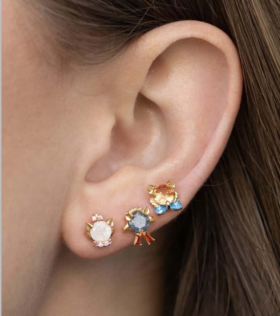 Charming cat-themed stud earrings with colorful gemstones for women and girls.