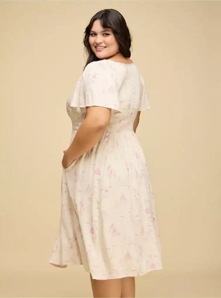 Stylish Disney-themed dress with charming print and comfortable fit, perfect for Disney fans.