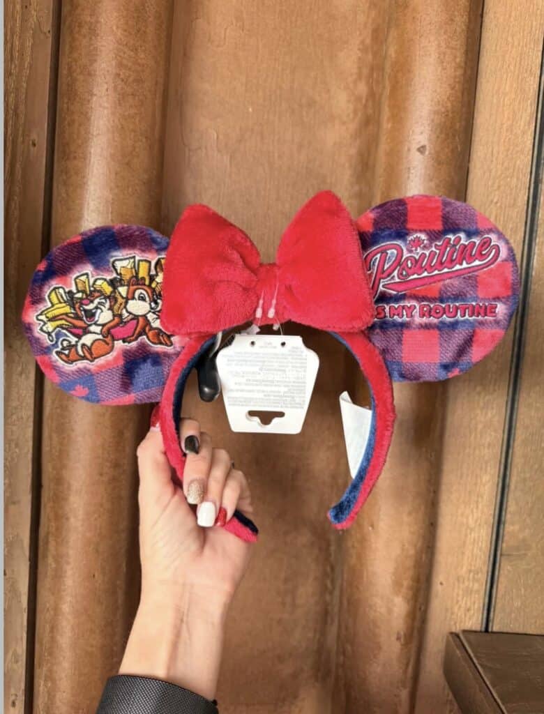 Disney Minnie Mouse headband with plush red bow, plaid ears, and Disney-themed patches for fans and Disney lovers.