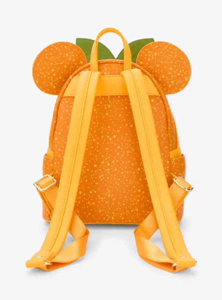 Colorful Disney Minnie Mouse themed backpack with polka dot design and ear accents. Perfect for Disney fans and kids.