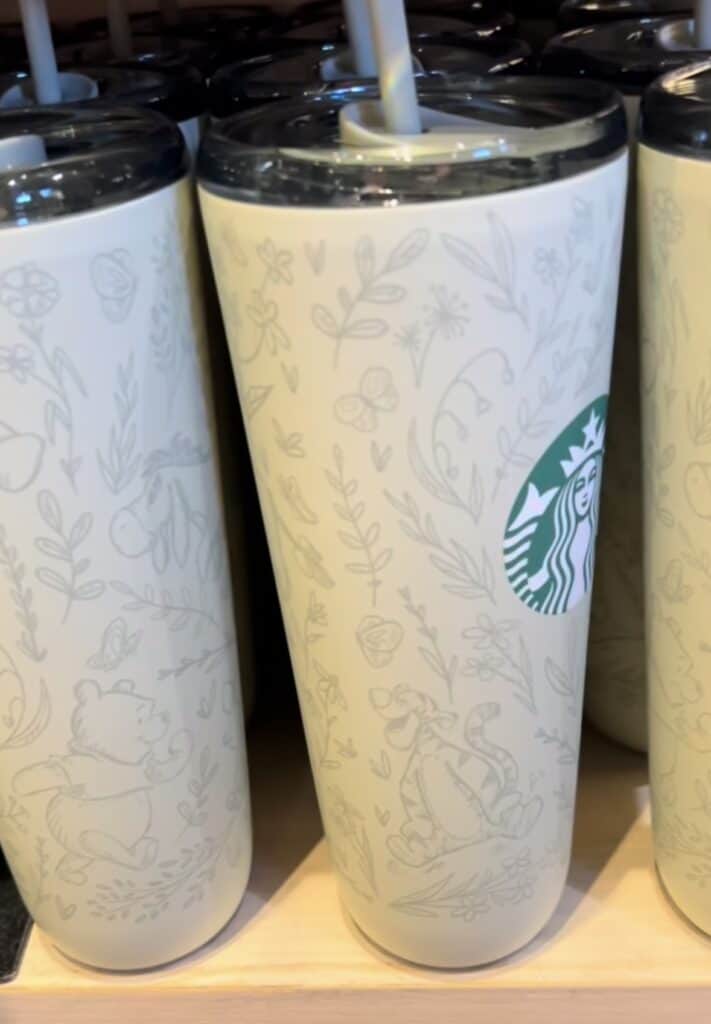 Stylish Disney-inspired straw tumbler with Winnie the Pooh & Eeyore design, perfect for Disney fans on the go.