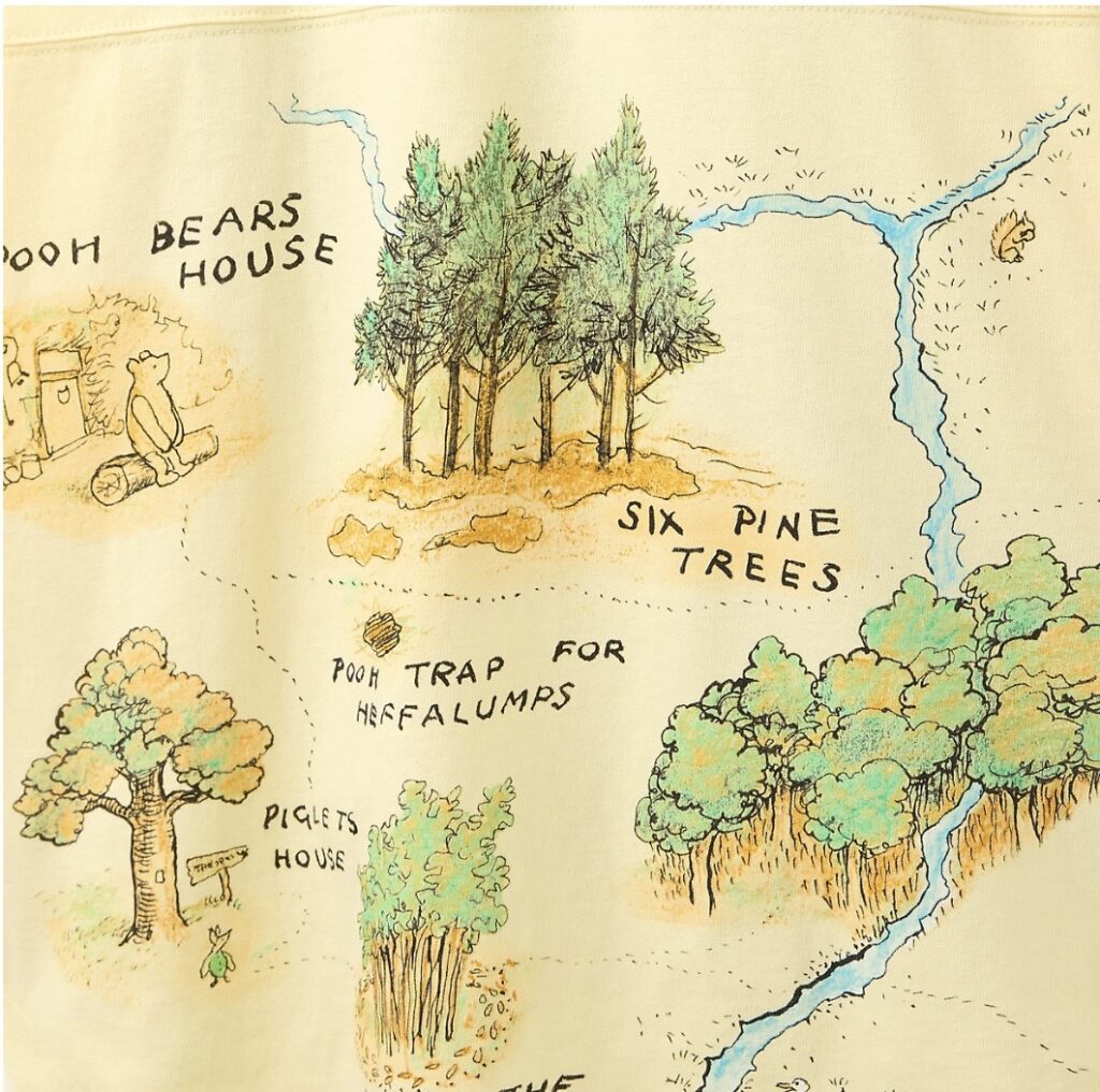 Colorful hand-drawn map from Disney's Winnie the Pooh featuring Pooh Bear's house, six pine trees, piglet's house, and the Pooh trap for heffalumps.
