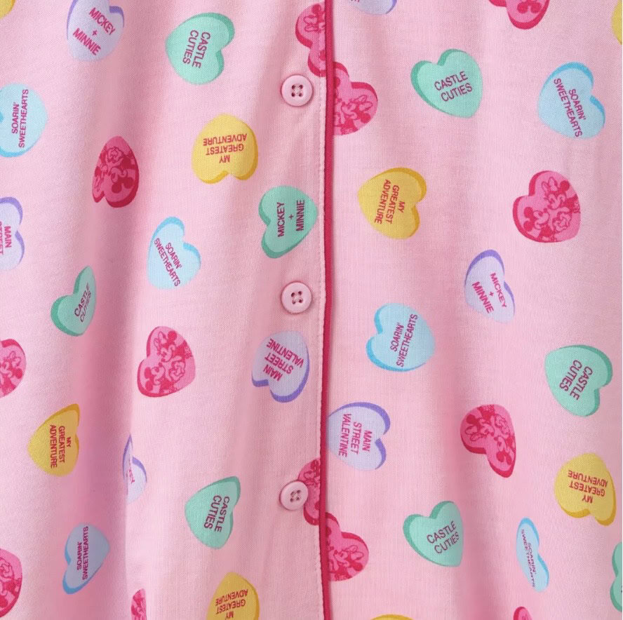 Cute Disney-inspired heart print pajama top. Perfect for Disney fashion lovers and cozy nights.
