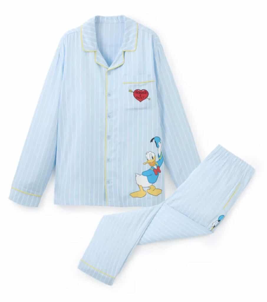 Light blue and white striped Disney pajamas featuring Donald Duck design and embroidered "Donald & Daisy" heart patch.