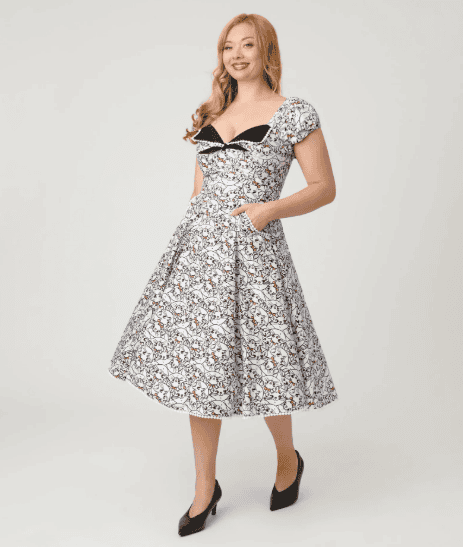 Vintage Disney dress with floral pattern, ideal for Disney lovers and fashion enthusiasts.