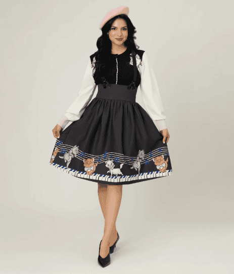 Beautiful Disney-themed fashion dress with musical note and character designs, perfect for Disney fans.