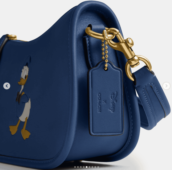 Blue Disney Donald Duck crossover shoulder bag with gold hardware.