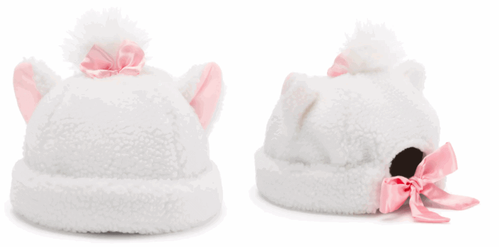 Unicorn plush slippers with pink satin bow, fluffy white design, cozy Disney-inspired footwear.