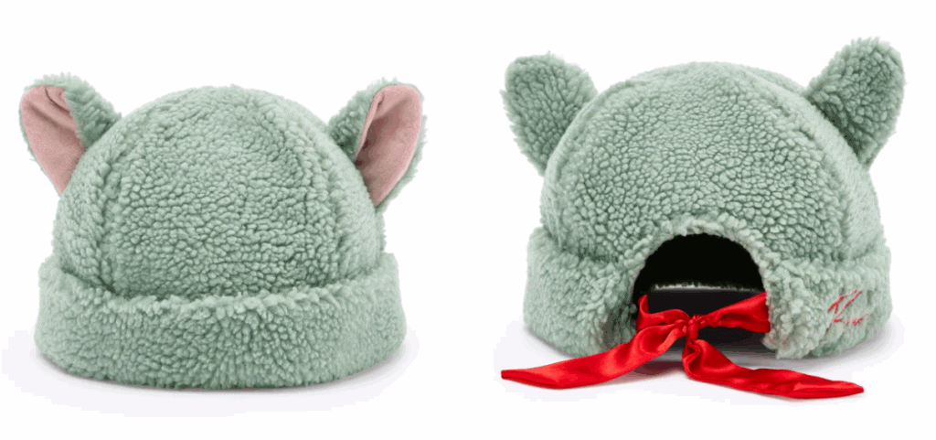Soft green plush Disney-themed fleece hat with animal ears.