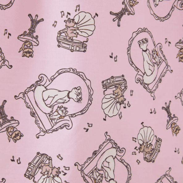 Colorful Disney-inspired fashion fabric with illustrations of classic characters and ornate picture frames.