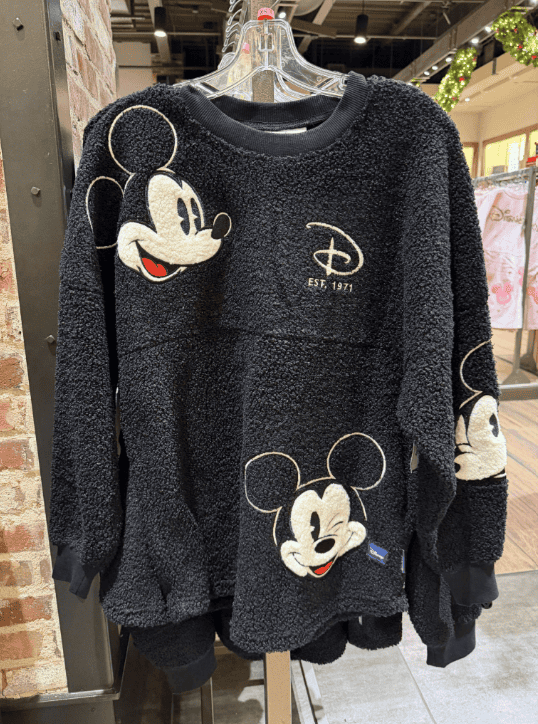 Soft black Mickey Mouse fleece sweatshirt for Disney fans.