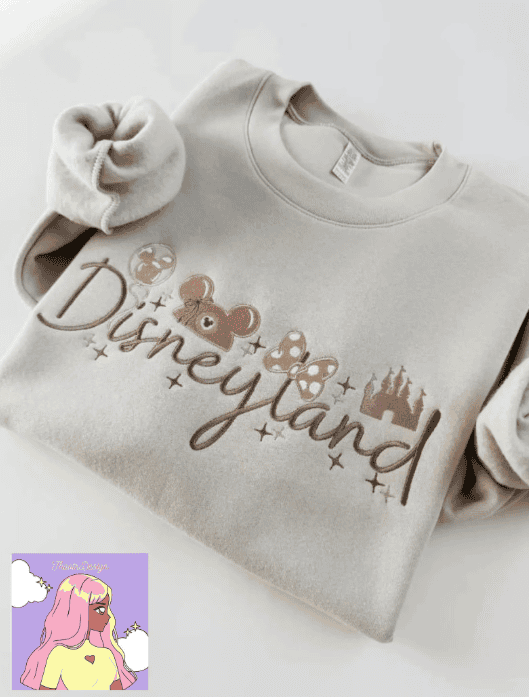 Cute Disneyland themed sweatshirt with mouse ears and castle graphic.