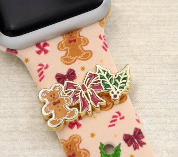 Cute gingerbread and holiday-themed socks featuring festive patterns and decorative charms.