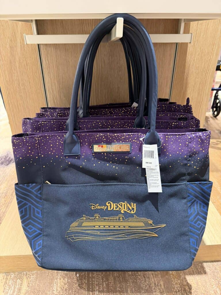 Disney cruise line tote bag with navy blue and gold print, perfect for Disney fans.