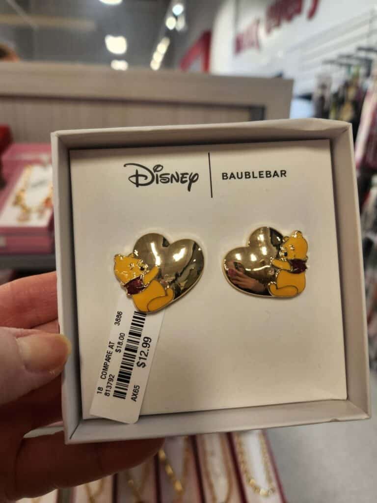 Cute Disney Winnie the Pooh earrings with gold hearts and character accents, perfect for Disney fans.