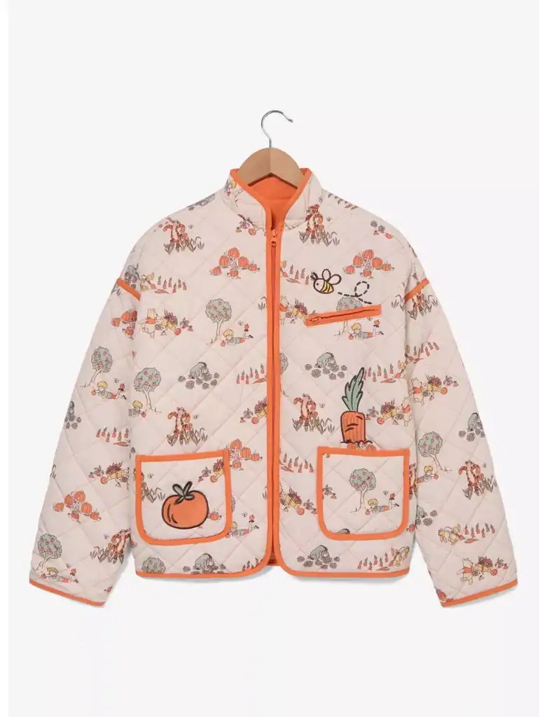 Colorful Disney-inspired vegetable print quilted jacket for kids with orange trimming and pockets.