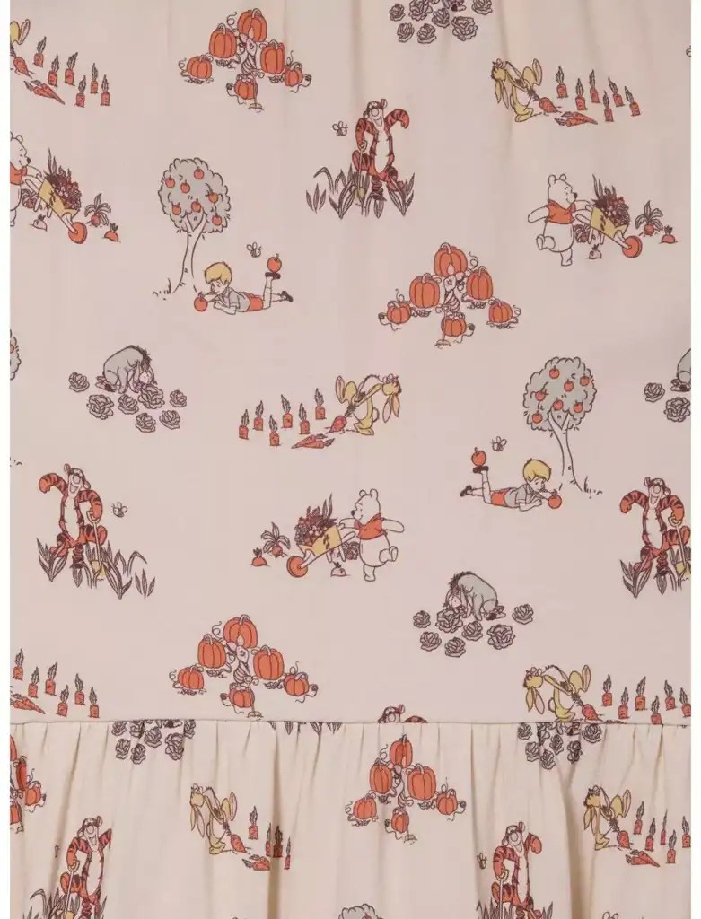 Whimsical Disney-inspired pumpkin pattern with characters from Winnie the Pooh, perfect for fall costume or dress.
