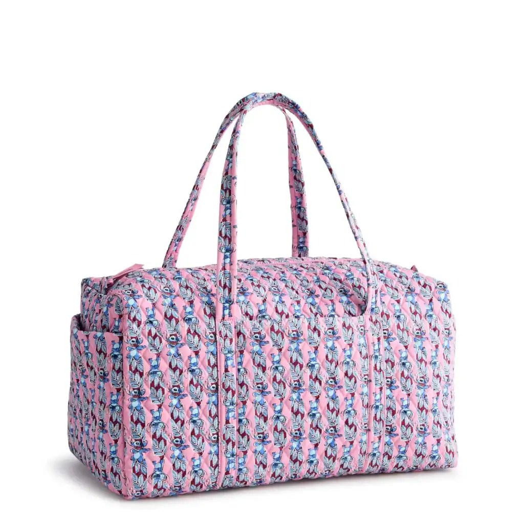 Pink Disney floral print duffel bag with spacious design, ideal for travel and gym.