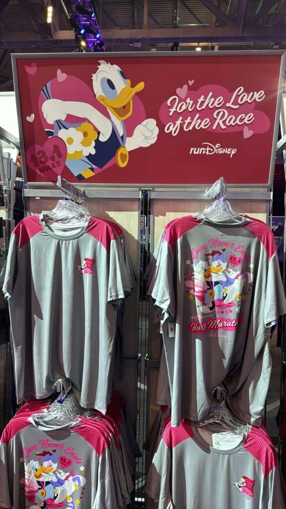 Disney race shirts with Donald Duck design and race details.
