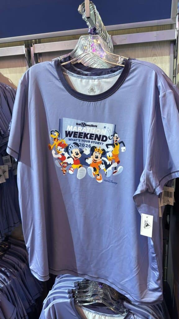 Colorful Disney superhero characters on marathon themed fitness shirt.