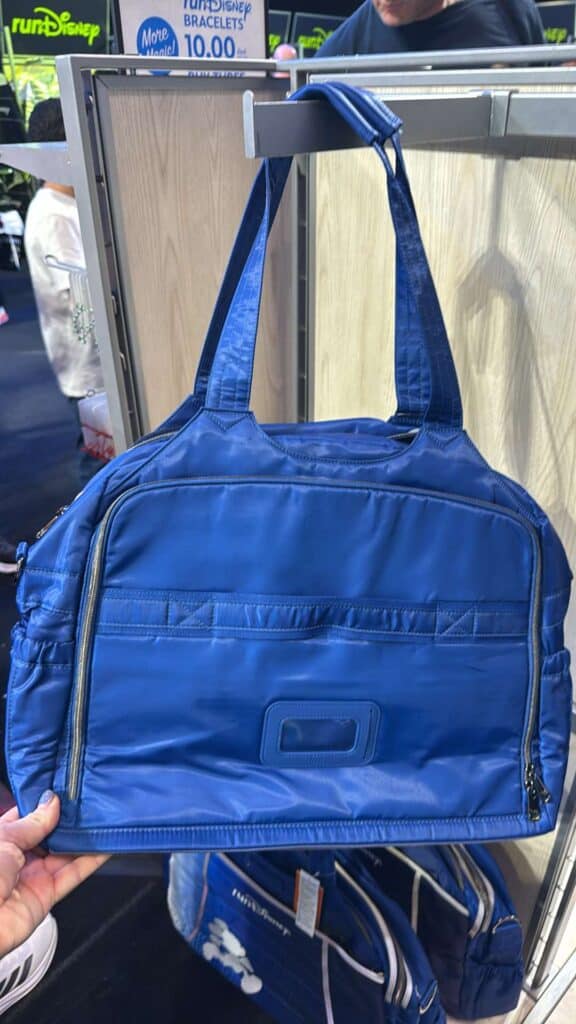 Versatile blue Disney gym and travel bag with multiple compartments, ideal for active lifestyles.