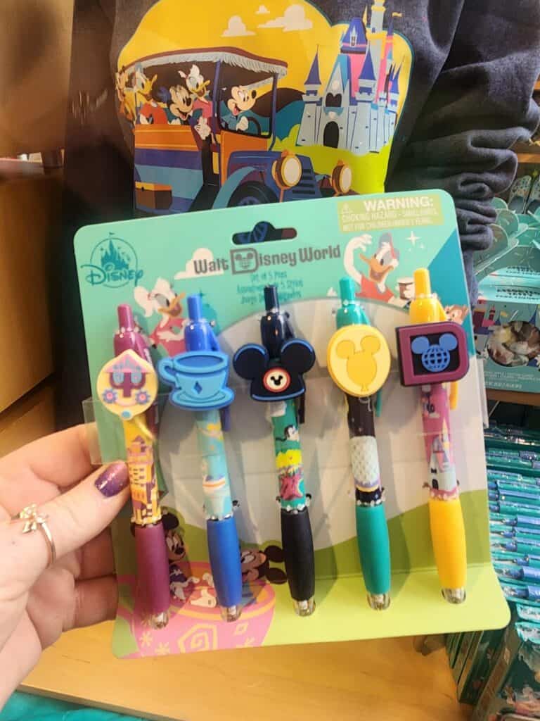 Colorful Disney-themed pens featuring Mickey, Minnie, and other characters, perfect for Disney fans and collectors.