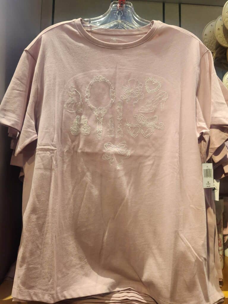 Disney princess accessories embroidery on pink tee, ideal for Disney fashion lovers.